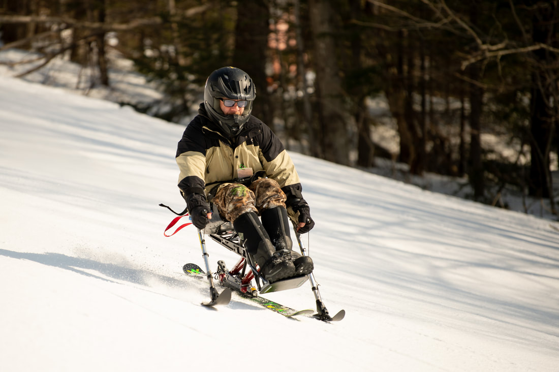 Keith seen adaptive skiing on the mountain.