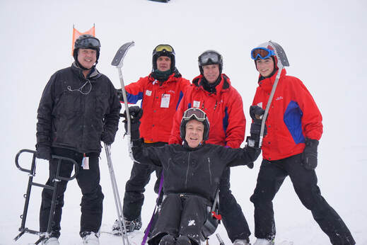 Adaptive Skier with BART Adaptive team members.